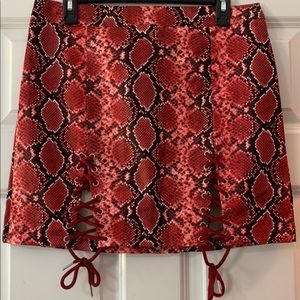 red snakeskin skirt